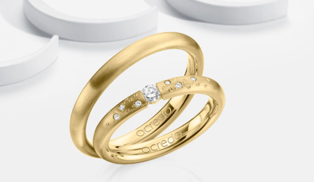 Elegant Tension Wedding Rings | acredo